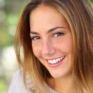 woman smiling outside