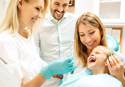 A child sitting in the dentist chair