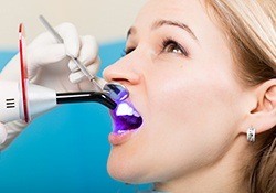 Woman receiving dental bonding treatment