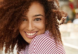 Young woman with healthy attractive smile