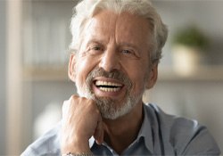 Man smiling with dentures