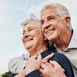 Smiling older man and woman