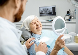 Older woman at dentist for dentures