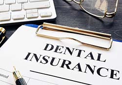 Dental insurance form resting on a table