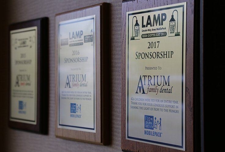 Awards hanging along wall