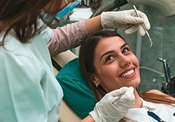 Smiling woman in dental chair