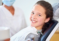 Smiling child in dental chair