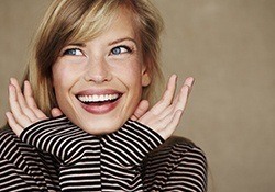 Woman framing her beautiful smile