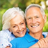 Older couple with healthy smiles