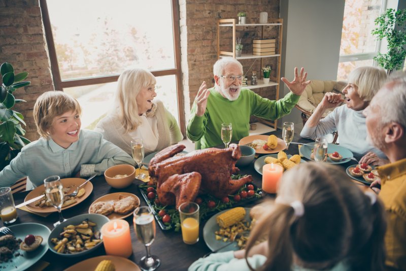 a man with dentures in New Lenox enjoying Thanksgiving dinner