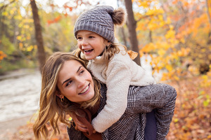 Someone smiling in a fall landscape