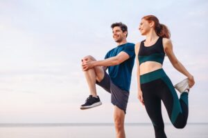 Two athletes getting ready for a run